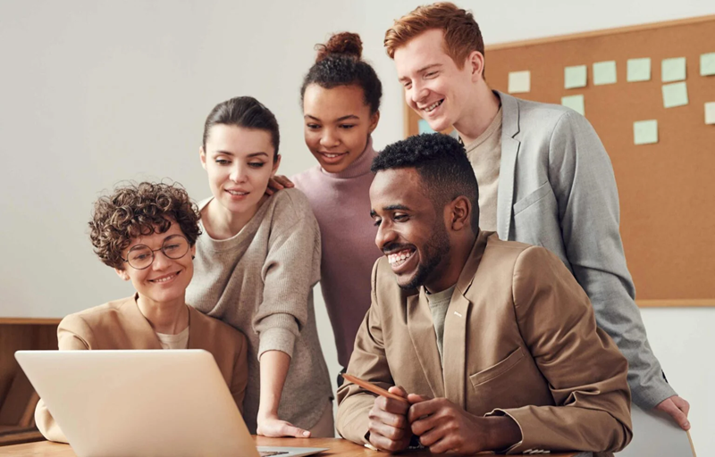 people working together in multi generational workforce