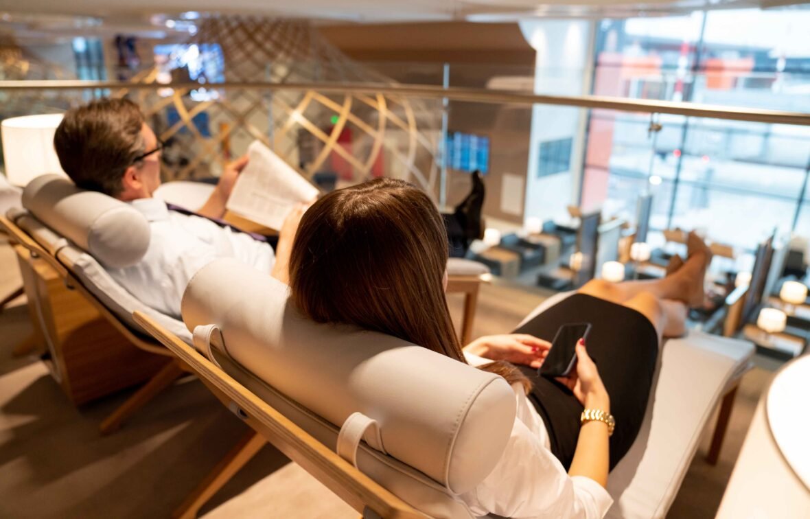 couple chilling at the airport lounge
