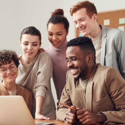 people working together in multi generational workforce