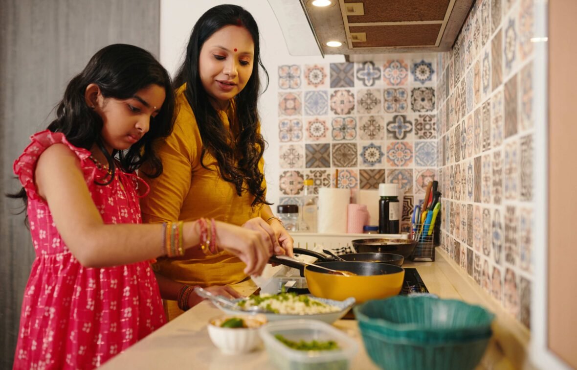 mother and daugher cooking in the kitchen
