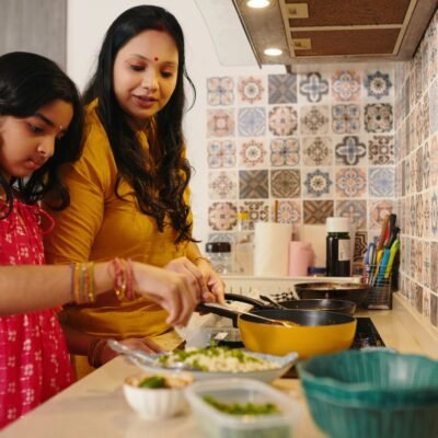 mother and daugher cooking in the kitchen