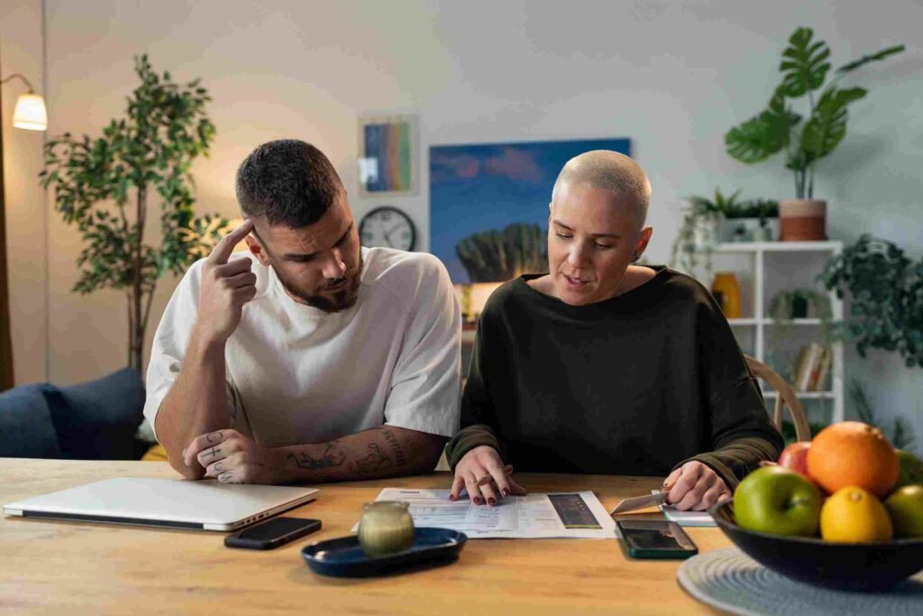 couple discussing money saving habits openly